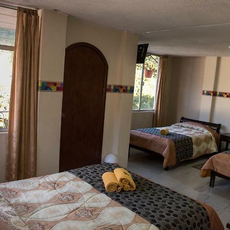 Hotel Flor De Oriente Banos  Bagian luar foto