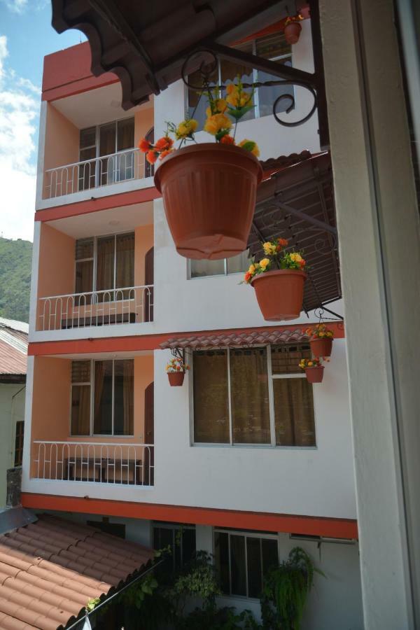 Hotel Flor De Oriente Banos  Bagian luar foto
