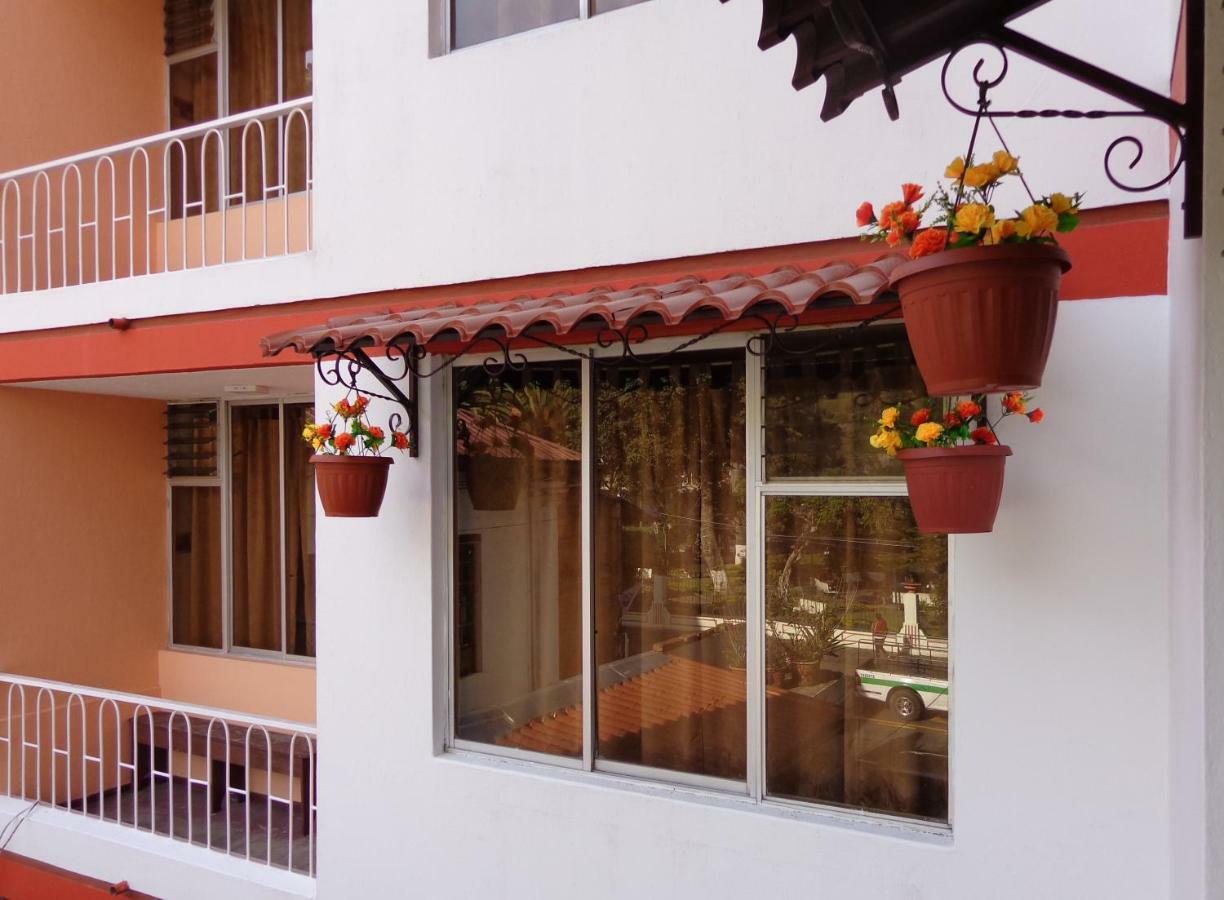 Hotel Flor De Oriente Banos  Bagian luar foto