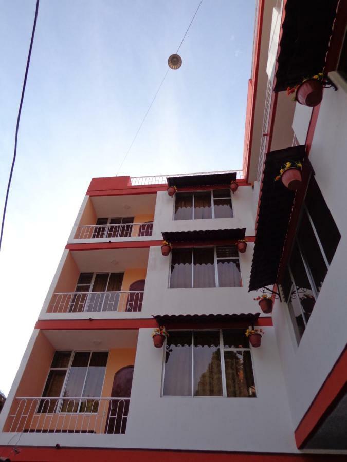 Hotel Flor De Oriente Banos  Bagian luar foto