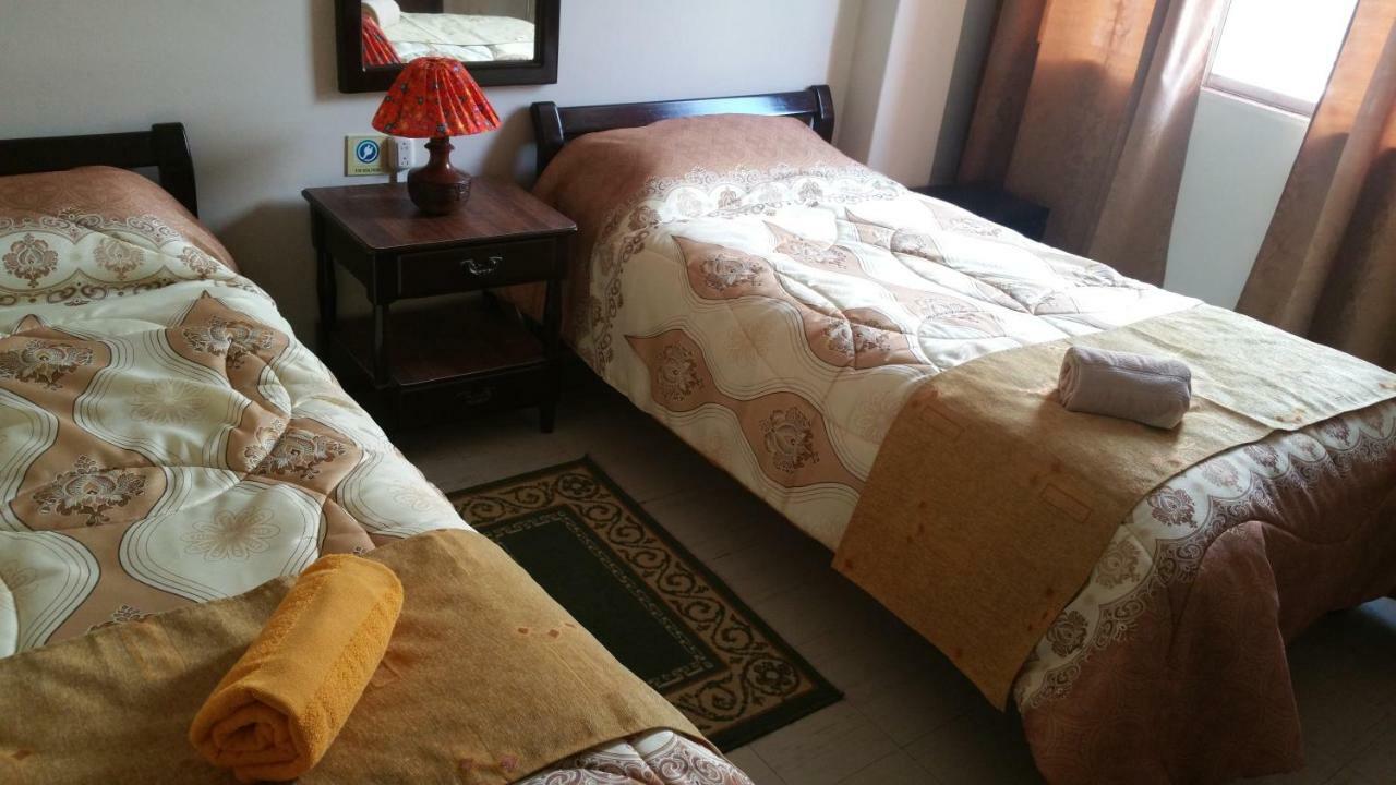 Hotel Flor De Oriente Banos  Bagian luar foto