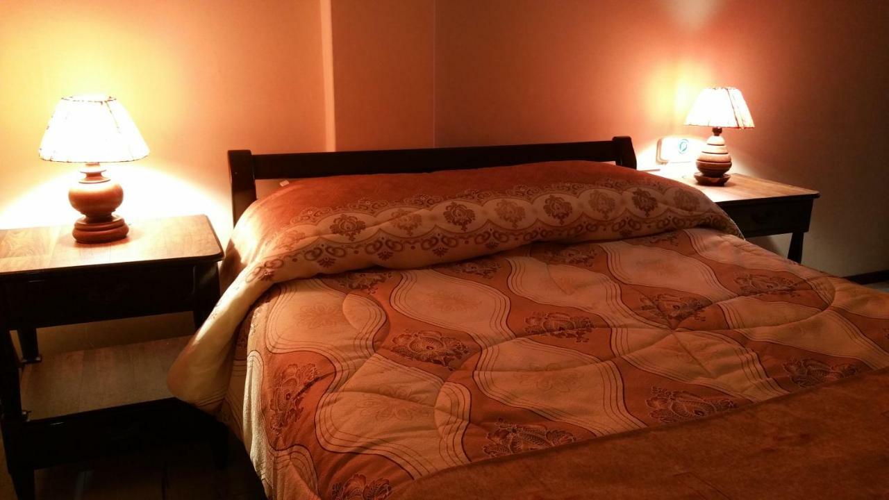 Hotel Flor De Oriente Banos  Bagian luar foto