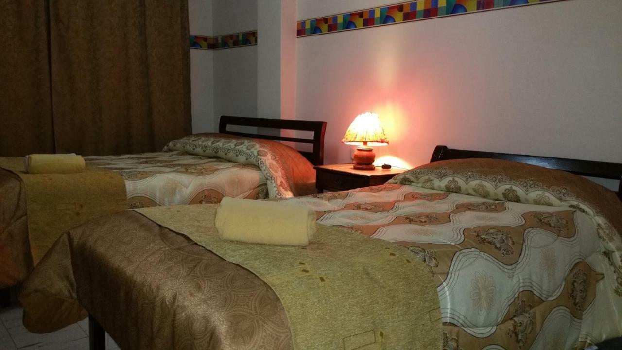 Hotel Flor De Oriente Banos  Bagian luar foto