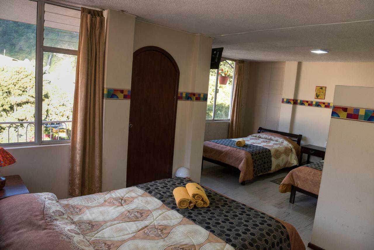 Hotel Flor De Oriente Banos  Bagian luar foto
